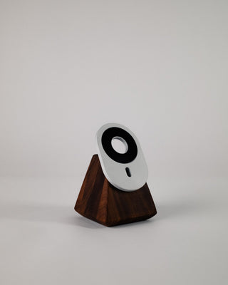Solid wood iPhone MagSafe charger stand side view showing grain detail