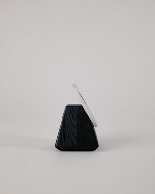 Solid wood iPhone MagSafe charger stand side view showing grain detail