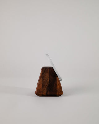 Solid wood iPhone MagSafe charger stand side view showing grain detail