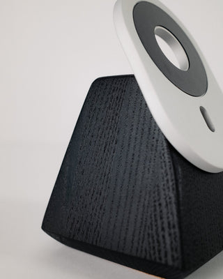 Black ash wood grain detail on handcrafted MagSafe phone stand