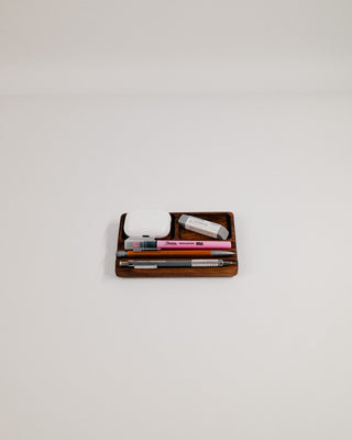 Monolith Desk Tray in walnut filled with everyday carry items including pens and small accessories