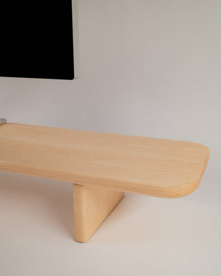 Monolith Desk Shelf maple surface detail showing monitor stand cutout and rounded edge profile